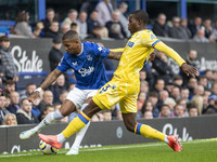 Ashley Young #18 of Everton F.C. is tackled by Tyrick Mitchell #3 of Crystal Palace F.C. during the Premier League match between Everton and...