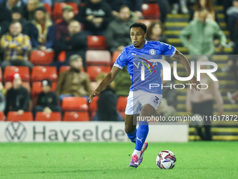 Ibou Touray of Stockport is in action during the Sky Bet League 1 match between Barnsley and Stockport County at Oakwell in Barnsley, Englan...