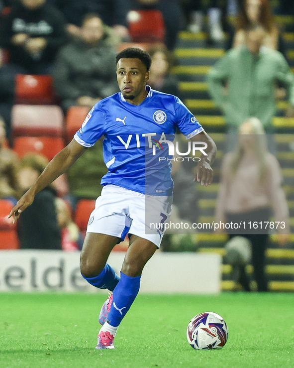 Ibou Touray of Stockport is in action during the Sky Bet League 1 match between Barnsley and Stockport County at Oakwell in Barnsley, Englan...