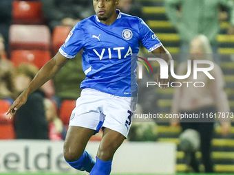 Ibou Touray of Stockport is in action during the Sky Bet League 1 match between Barnsley and Stockport County at Oakwell in Barnsley, Englan...