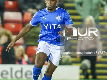 Ibou Touray of Stockport is in action during the Sky Bet League 1 match between Barnsley and Stockport County at Oakwell in Barnsley, Englan...