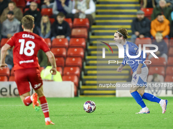 Lewis Bate of Stockport is in action during the Sky Bet League 1 match between Barnsley and Stockport County at Oakwell in Barnsley, England...