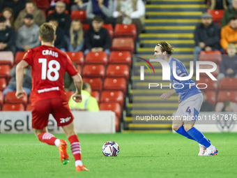 Lewis Bate of Stockport is in action during the Sky Bet League 1 match between Barnsley and Stockport County at Oakwell in Barnsley, England...