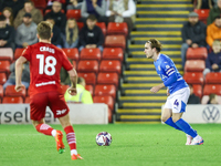 Lewis Bate of Stockport is in action during the Sky Bet League 1 match between Barnsley and Stockport County at Oakwell in Barnsley, England...