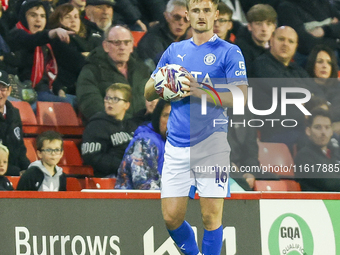 #16, Callum Connolly of Stockport prepares to take a throw-in during the Sky Bet League 1 match between Barnsley and Stockport County at Oak...