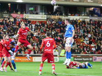 Marc Roberts of Barnsley gets up to head the ball clear during the Sky Bet League 1 match between Barnsley and Stockport County at Oakwell i...