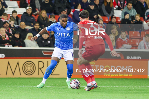 #10, Jayden Fevrier of Stockport tries to get past #32, Josh Earl of Barnsley during the Sky Bet League 1 match between Barnsley and Stockpo...