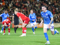 Louie Barry of Stockport races to celebrate his injury-time equalizer during the Sky Bet League 1 match between Barnsley and Stockport Count...