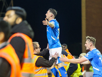 #20, Louie Barry of Stockport (center) celebrates in front of the traveling fans during the Sky Bet League 1 match between Barnsley and Stoc...