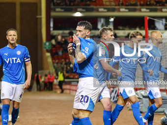 Louie Barry of Stockport celebrates his goal in front of the fans during the Sky Bet League 1 match between Barnsley and Stockport County at...