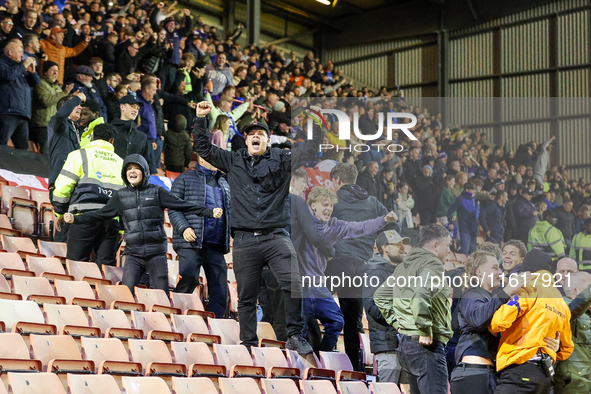 The Stockport fans are energized by the injury time equalizer by #20, Louie Barry, during the Sky Bet League 1 match between Barnsley and St...