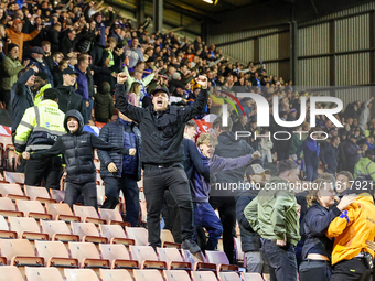 The Stockport fans are energized by the injury time equalizer by #20, Louie Barry, during the Sky Bet League 1 match between Barnsley and St...