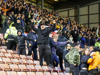 The Stockport fans are energized by the injury time equalizer by #20, Louie Barry, during the Sky Bet League 1 match between Barnsley and St...