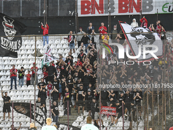 Fans of UTA Arad during the Romanian Superliga: CFR Cluj vs. UTA Arad at Dr. Constantin Radulescu Stadium in Cluj-Napoca, Romania, on Septem...