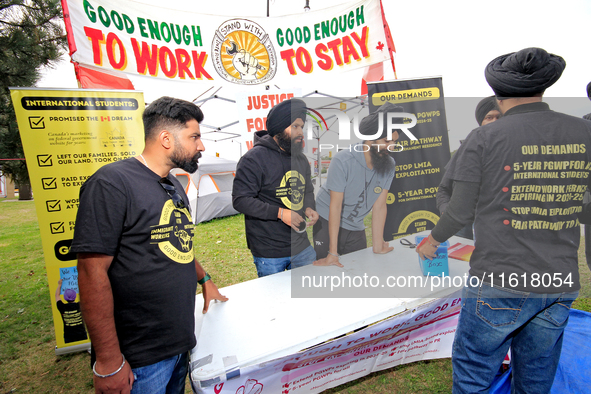 Organizers set up for a protest at an international students' encampment in Brampton, Canada, on September 28, 2024. The encampment is in it...