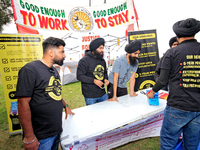 Organizers set up for a protest at an international students' encampment in Brampton, Canada, on September 28, 2024. The encampment is in it...