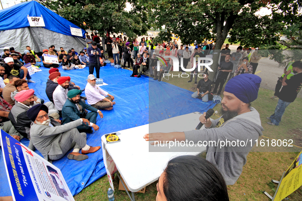 Organizer Amar Deep Singh speaks during a protest rally at an international students' encampment in Brampton, Canada, on September 28, 2024....