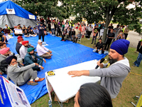 Organizer Amar Deep Singh speaks during a protest rally at an international students' encampment in Brampton, Canada, on September 28, 2024....