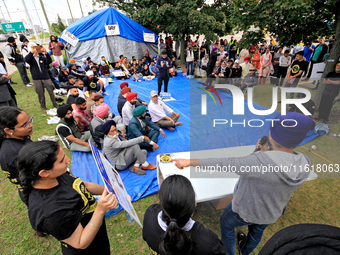 Organizer Amar Deep Singh speaks during a protest rally at an international students' encampment in Brampton, Canada, on September 28, 2024....