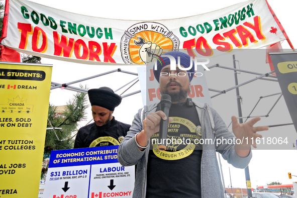 Organizer Amar Deep Singh speaks during a protest rally at an international students' encampment in Brampton, Canada, on September 28, 2024....