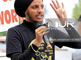 Organizer Mehakdeep Singh speaks during a protest rally at an international students' encampment in Brampton, Canada, on September 28, 2024....