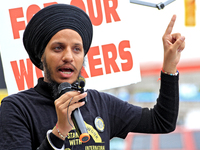 Organizer Mehakdeep Singh speaks during a protest rally at an international students' encampment in Brampton, Canada, on September 28, 2024....