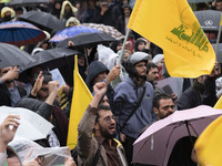 An Iranian protester shouts anti-Israeli and anti-U.S. slogans while mourning during a protest gathering to condemn an Israeli air strike ag...