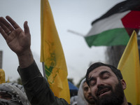 An Iranian protester shouts anti-Israeli and anti-U.S. slogans while mourning during a protest gathering to condemn an Israeli air strike ag...