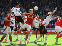 Ryan Yates of Nottingham Forest battles for the ball during the Premier League match between Nottingham Forest and Fulham at the City Ground...