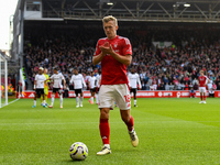 James Ward-Prowse of Nottingham Forest applauds the Forest supporters during the Premier League match between Nottingham Forest and Fulham a...