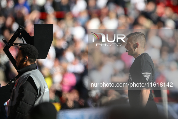 Referee Joshua Smith at the VAR screen during the Premier League match between Nottingham Forest and Fulham at the City Ground in Nottingham...