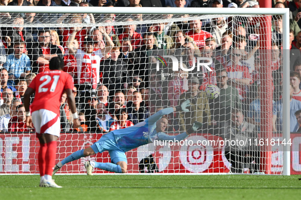 Matz Sels, Nottingham Forest goalkeeper, dives for the ball as Fulham scores from the penalty spot during the Premier League match between N...