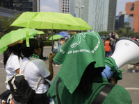 Feminist groups with umbrellas march from the Glorieta de las Mujeres que Luchan to the Zocalo in Mexico City, Mexico, on September 28, 2024...