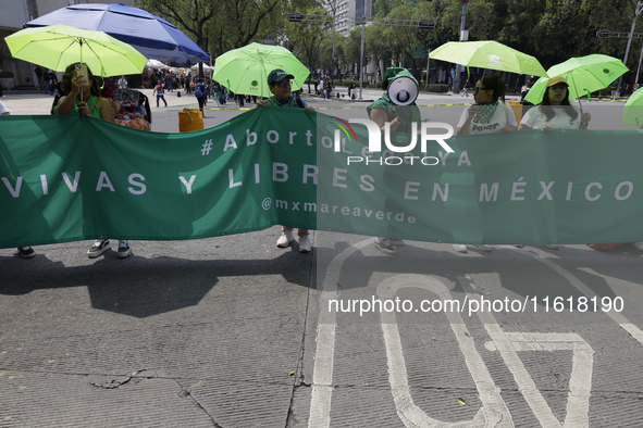 Various feminist collectives march in Mexico City, Mexico, on September 28, 2024, from various points to the capital's Zocalo to mark the Gl...