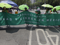 Various feminist collectives march in Mexico City, Mexico, on September 28, 2024, from various points to the capital's Zocalo to mark the Gl...