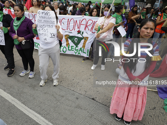 Various feminist collectives march in Mexico City, Mexico, on September 28, 2024, from various points to the capital's Zocalo to mark the Gl...