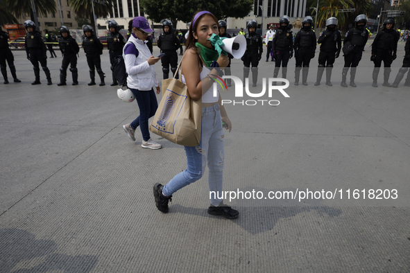 Various feminist collectives march in Mexico City, Mexico, on September 28, 2024, from various points to the capital's Zocalo to mark the Gl...