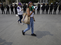 Various feminist collectives march in Mexico City, Mexico, on September 28, 2024, from various points to the capital's Zocalo to mark the Gl...