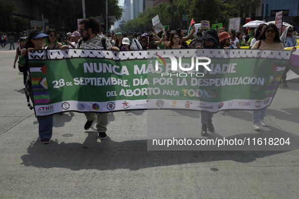 Various feminist collectives march in Mexico City, Mexico, on September 28, 2024, from various points to the capital's Zocalo to mark the Gl...