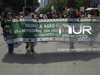 Various feminist collectives march in Mexico City, Mexico, on September 28, 2024, from various points to the capital's Zocalo to mark the Gl...