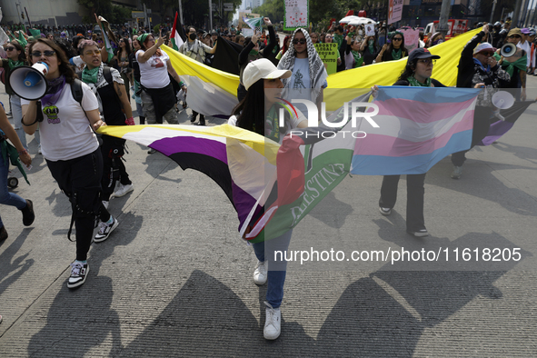 Various feminist collectives march in Mexico City, Mexico, on September 28, 2024, from various points to the capital's Zocalo to mark the Gl...