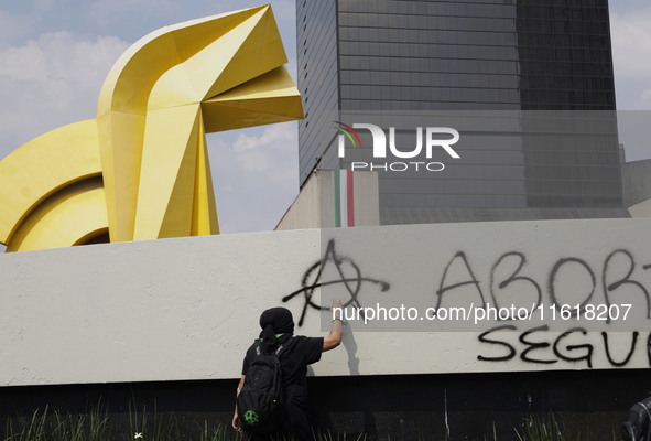 Feminist Black Bloc carries out direct action on September 28, 2024, and marches from the Glorieta de las Mujeres que Luchan to the Zocalo i...