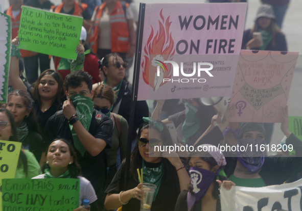 Various feminist collectives march in Mexico City, Mexico, on September 28, 2024, from various points to the capital's Zocalo to mark the Gl...