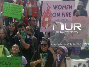 Various feminist collectives march in Mexico City, Mexico, on September 28, 2024, from various points to the capital's Zocalo to mark the Gl...