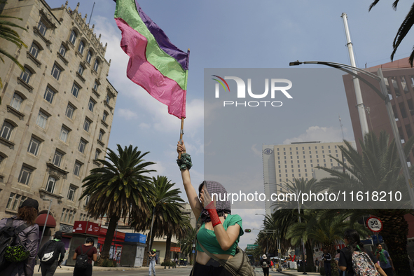 Various feminist collectives march in Mexico City, Mexico, on September 28, 2024, from various points to the capital's Zocalo to mark the Gl...