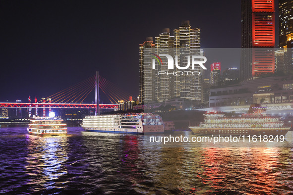 Tourists take a cruise to travel in Chongqing, China, on September 28, 2024. 