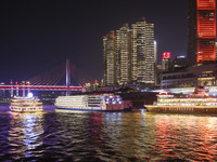 Tourists take a cruise to travel in Chongqing, China, on September 28, 2024. (