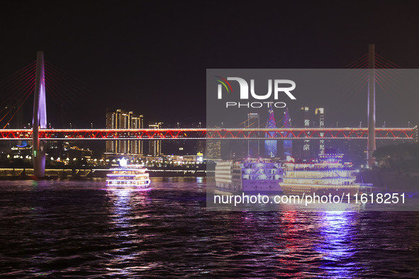 Tourists take a cruise to travel in Chongqing, China, on September 28, 2024. 