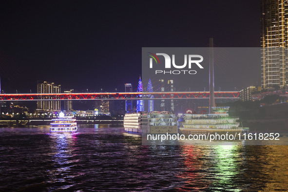 Tourists take a cruise to travel in Chongqing, China, on September 28, 2024. 