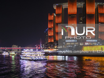 Tourists take a cruise to travel in Chongqing, China, on September 28, 2024. (